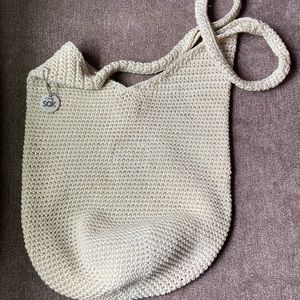 The Sak cream colored crochet hobo bag
